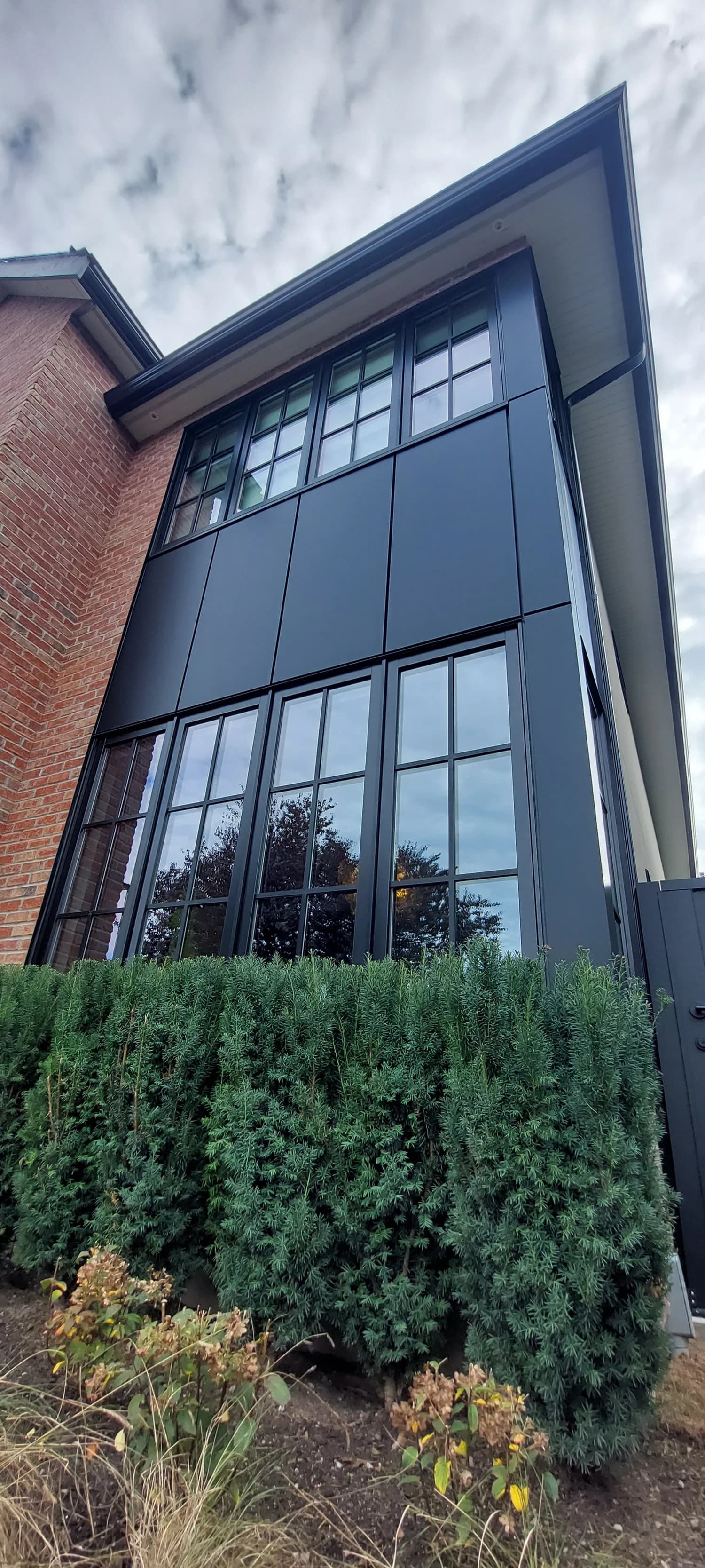 Full exterior renovation with new siding and trim by Tomron Construction in Coquitlam, BC