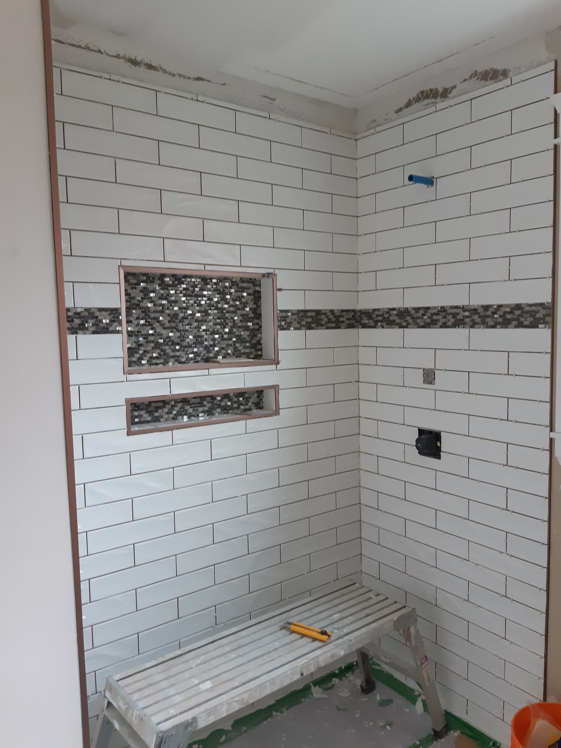 Bathroom flooring and wall tile installation by Tomron Construction in Maple Ridge, BC