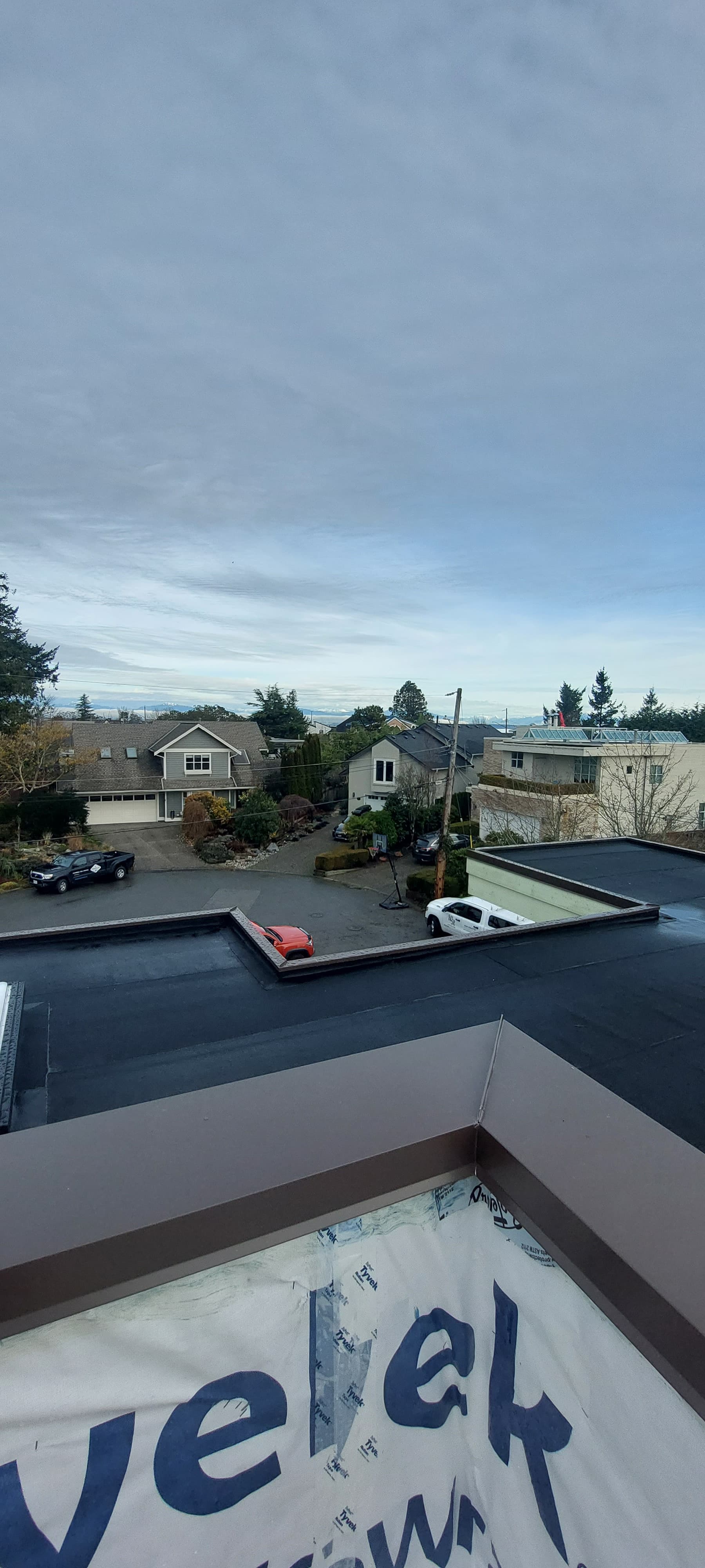 Rake flashing installation along gable edge by Tomron Construction in Maple Ridge, BC