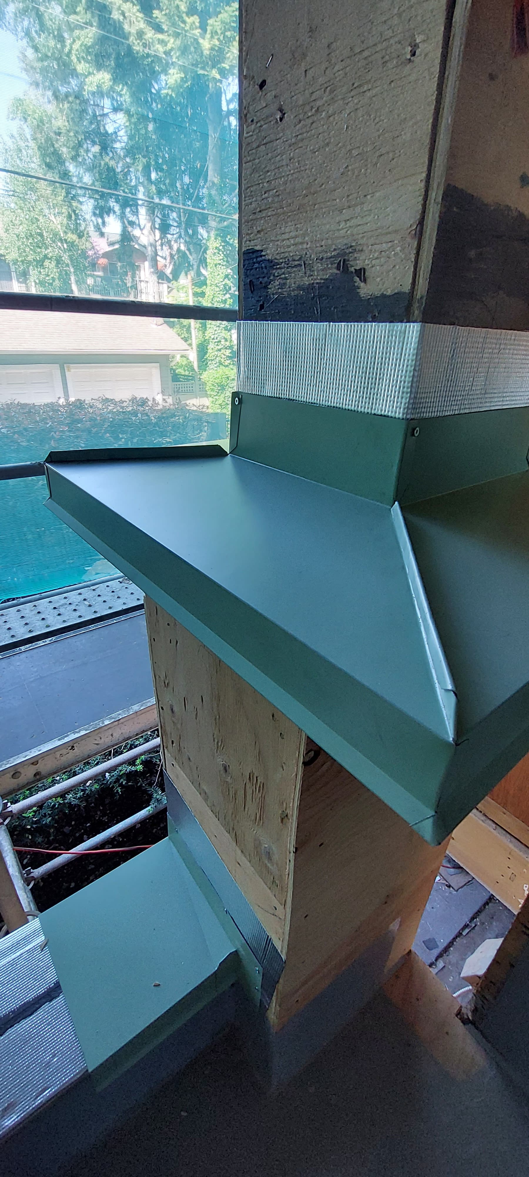 Counter-flashing at material transition point by Tomron Construction in Maple Ridge, BC